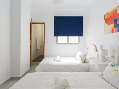 Cama o camas de una habitación en Sweet House Las Canteras