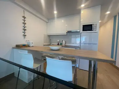 Una cocina o zona de cocina en PARAISO designer conditioned apartment with terrace