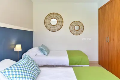 Cama o camas de una habitación en Top Salobre Villas by VillaGranCanaria