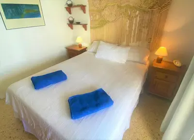 Cama o camas de una habitación en Salinetas, frente al mar y playa