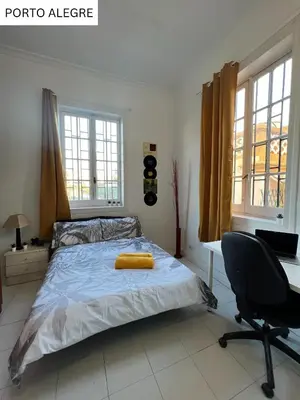 Cama o camas de una habitación en CoLiving Villa Brasil