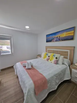 Cama o camas de una habitación en Alojamientos Agaete Pueblo Nº7
