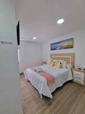 Cama o camas de una habitación en Alojamientos Agaete Pueblo Nº7