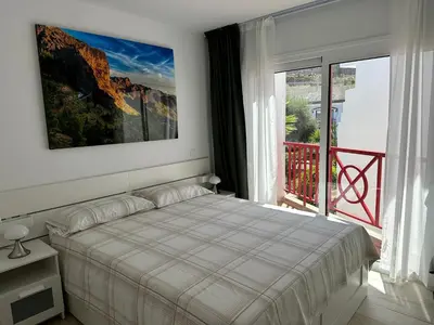 Cama o camas de una habitación en MODERN DUPLEX 50m FROM THE BEACH