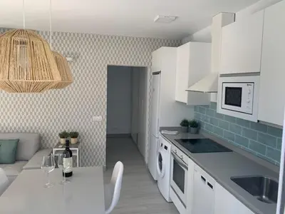 Una cocina o zona de cocina en Renovated 2 bedroom bungalow in playa del inglés