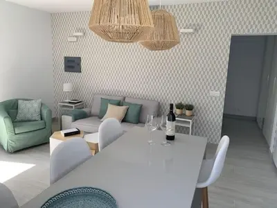 Zona de estar de Renovated 2 bedroom bungalow in playa del inglés