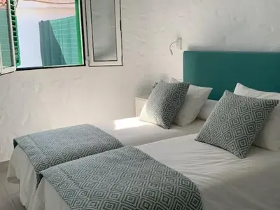 Cama o camas de una habitación en Renovated 2 bedroom bungalow in playa del inglés