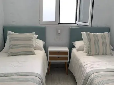 Cama o camas de una habitación en Renovated 2 bedroom bungalow in playa del inglés