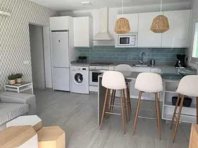 Una cocina o zona de cocina en Renovated 2 bedroom bungalow in playa del inglés