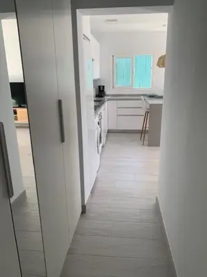 Una cocina o zona de cocina en Renovated 2 bedroom bungalow in playa del inglés