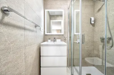 Un baño de City and Beach Home, Las Canteras