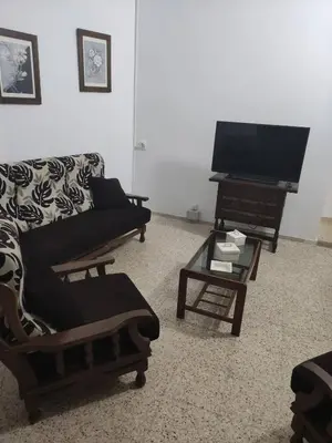 Una televisión o centro de entretenimiento en San Gregorio House