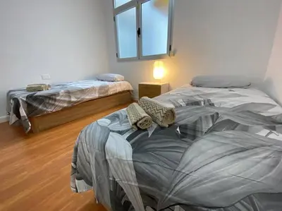 Cama o camas de una habitación en Sand & Sun - 2 Bedrooms Apartment 50m beach