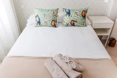 Cama o camas de una habitación en Apartamento en el barrio de Triana V76