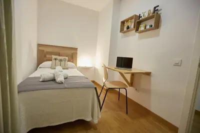 Cama o camas de una habitación en Canteras Suite Gran Canaria