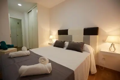 Cama o camas de una habitación en Canteras Suite Gran Canaria