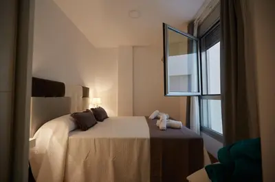 Cama o camas de una habitación en Canteras Suite Gran Canaria