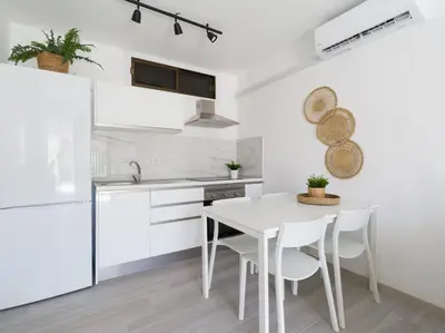 Una cocina o zona de cocina en Cumana Suites Puerto Rico