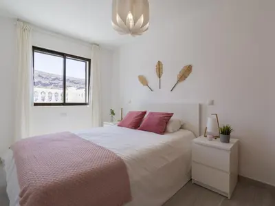 Cama o camas de una habitación en Cumana Suites Puerto Rico