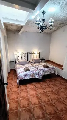 Cama o camas de una habitación en Casa Cueva Barranco Hondo