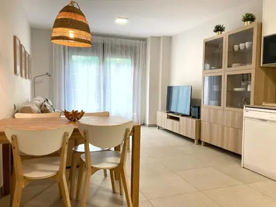 Una televisión o centro de entretenimiento en Stylish family flat by Canary365