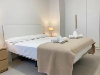 Cama o camas de una habitación en Stylish family flat by Canary365