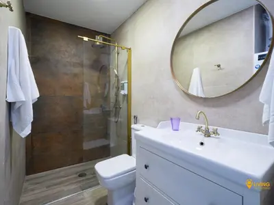 Un baño de Living Las Canteras Homes- VIEW POINT