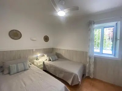 Cama o camas de una habitación en Modern Duplex apartment near swimming pool