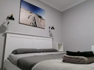 Cama o camas de una habitación en CANTERAS BEACH FLAT