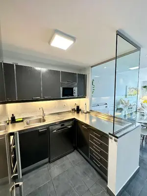 Una cocina o zona de cocina en Casa con terraza y piscina en Pasito Blanco, cerca de Maspalomas