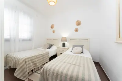 Cama o camas de una habitación en Doña Juana 4