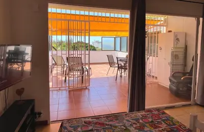Una televisión o centro de entretenimiento en Sea views, relax, Maspalomas, enjoy!