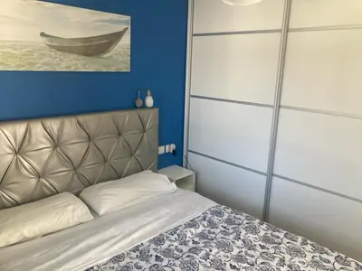 Cama o camas de una habitación en Apartamento Jumilla Vista Mar 35