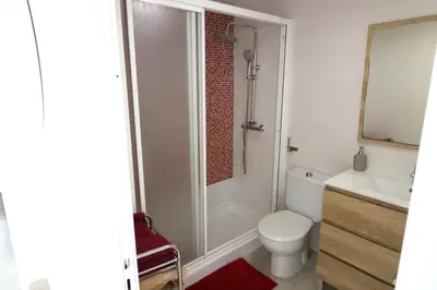 Un baño de Bungalow - Piscina climatizada - Playa del Inglés