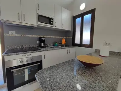 Una cocina o zona de cocina en Bungalow Santa Fe next to pool