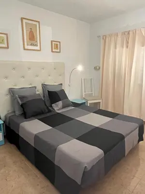 Cama o camas de una habitación en Juncos II Apartamento