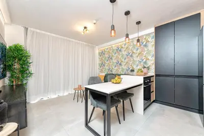 Una cocina o zona de cocina en Airbnb cerca de la playa