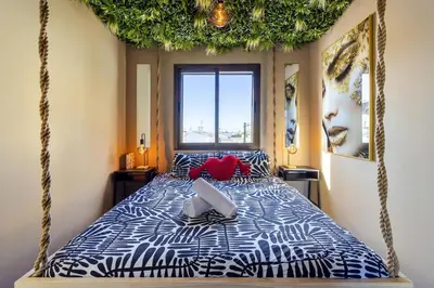 Cama o camas de una habitación en Casa LINC - Renovated Apt Close to Center and Beach