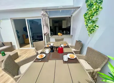 Zona de estar de Sunrise Terrace Apartment