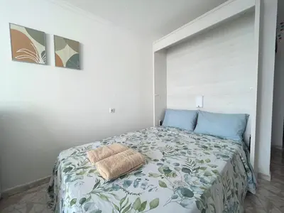 Cama o camas de una habitación en Ocean Views - Beach Apartment