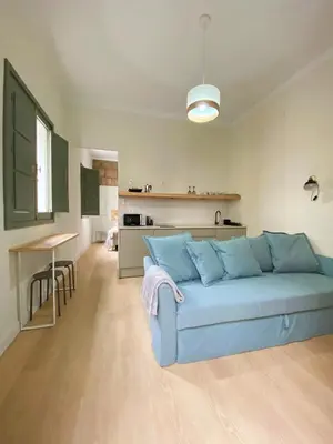 Zona de estar de La Puebla Rooms