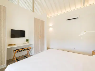 Cama o camas de una habitación en Agroturismo Suites Hacienda los Olivos
