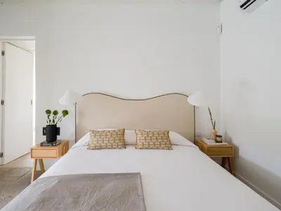 Cama o camas de una habitación en Agroturismo Suites Hacienda los Olivos
