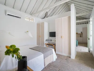 Cama o camas de una habitación en Agroturismo Suites Hacienda los Olivos