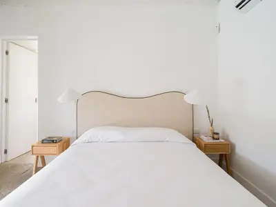 Cama o camas de una habitación en Agroturismo Suites Hacienda los Olivos
