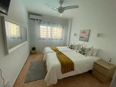 Cama o camas de una habitación en Iguazu dreams apartment