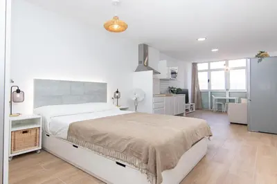 Cama o camas de una habitación en “Alma Beach” apartamento
