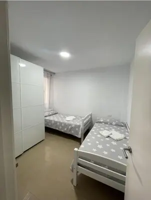 Cama o camas de una habitación en SeawaveSunGranCanaria