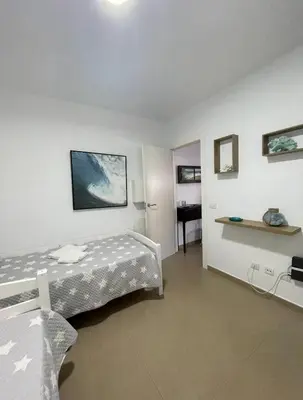 Cama o camas de una habitación en SeawaveSunGranCanaria