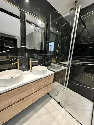 Un baño de Mirador Suites